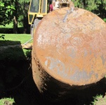 An underground oil storage tank being removed by Anderson Tank Co
